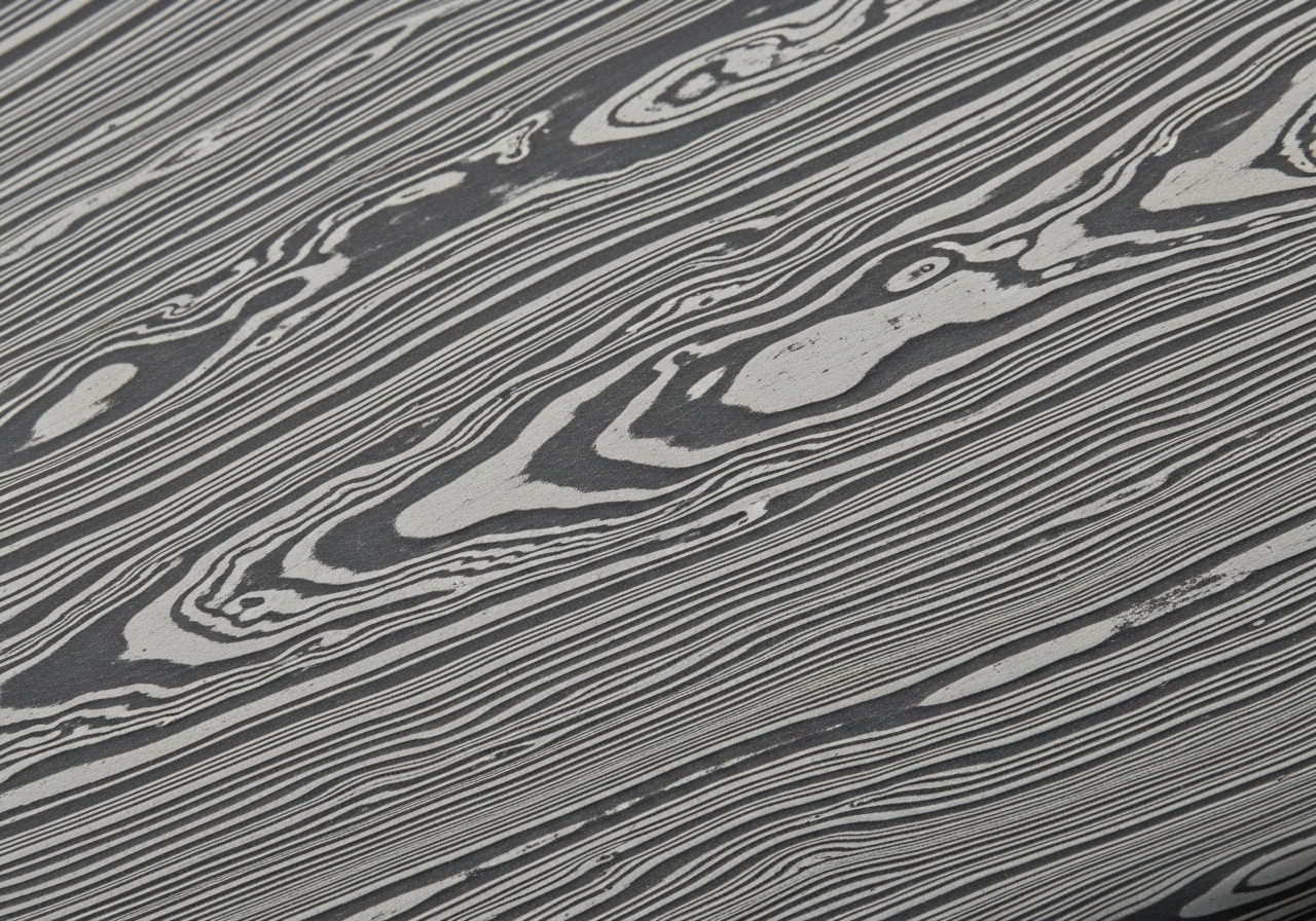 Authentic Damascus steel pattern showing distinct layers and depth.